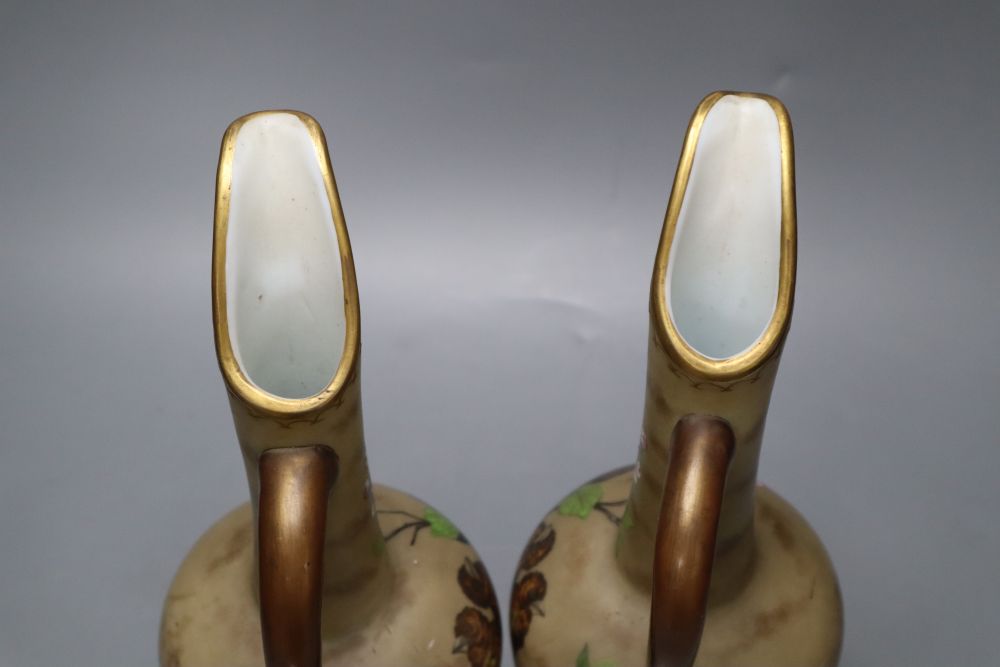 A pair of Victorian opaline glass ewers, height 34cm